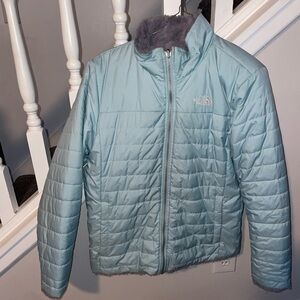 Light blue reversible north face winter coat